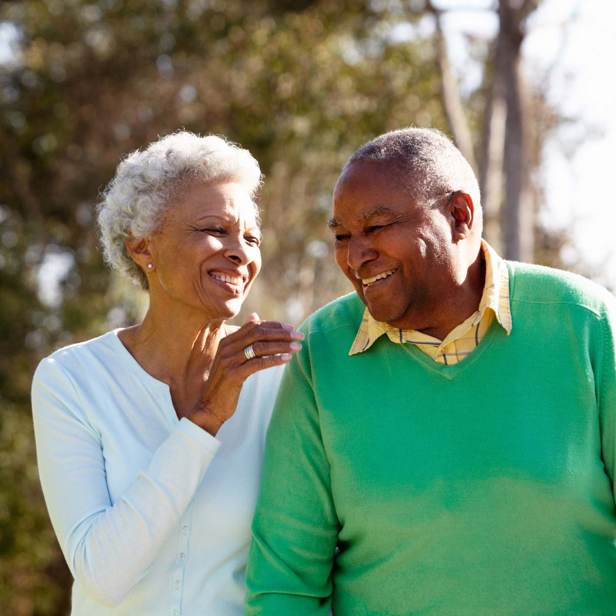 elderly couple smiling together